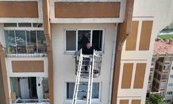 Yangın paniğe neden oldu, apartman sakinleri itfaiye merdiveniyle tahliye edildi