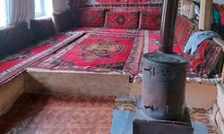 Kapıyı açamayınca duvarı delmişti, jandarmadan kaçamayan hırsız çaldığı halılarla yakalandı