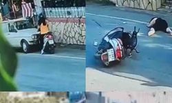 Otomobille motosikletlinin üzerinden geçti: O anlar kamerada